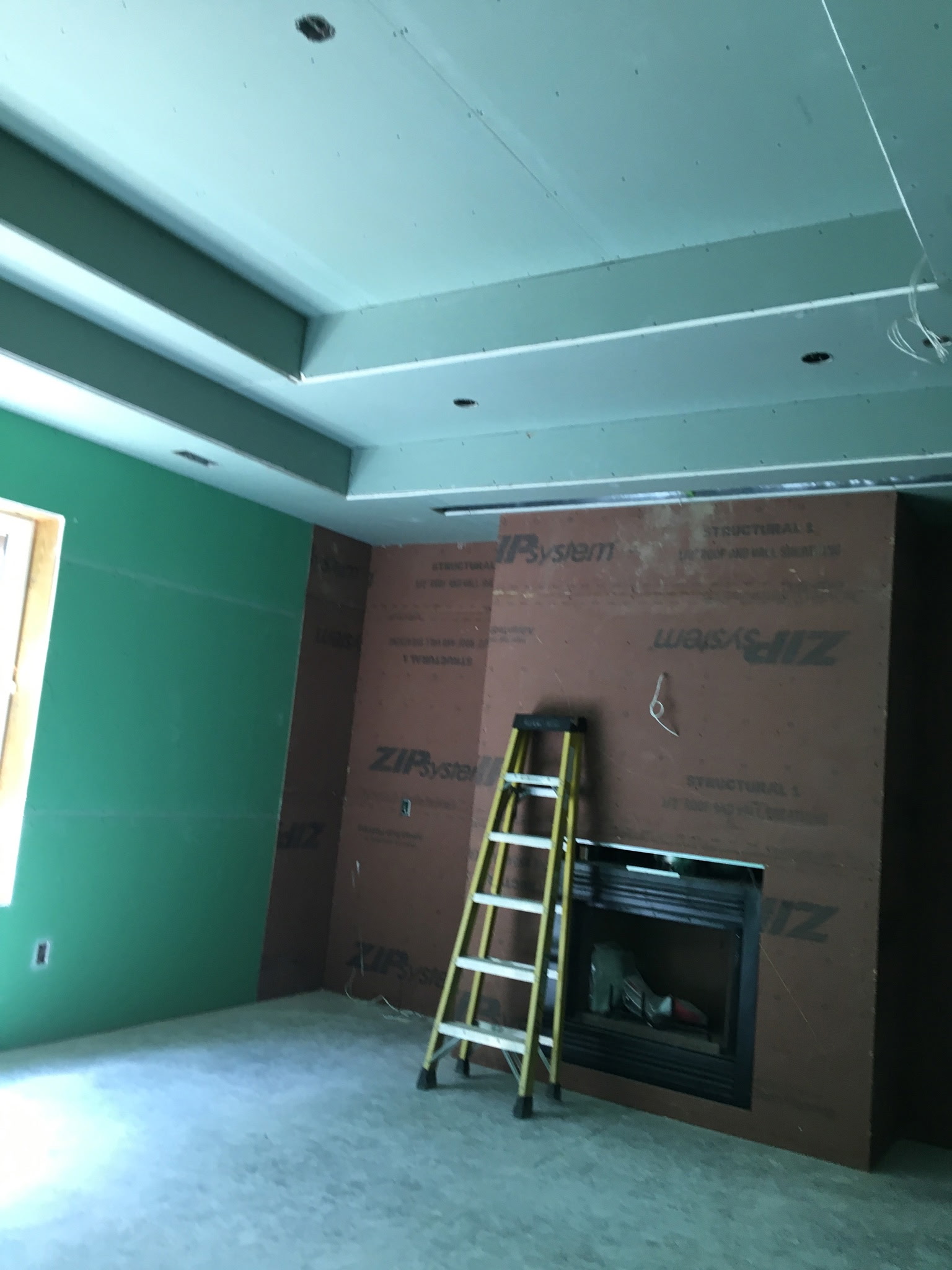 Interior fireplace and finish work in progress